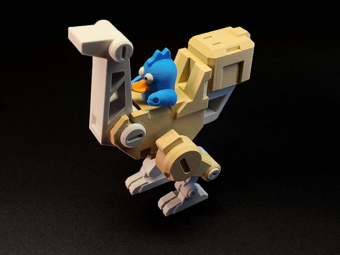 White and blue bird-frame mech